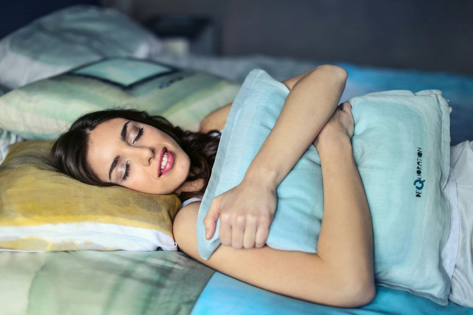 woman hugging her pillow