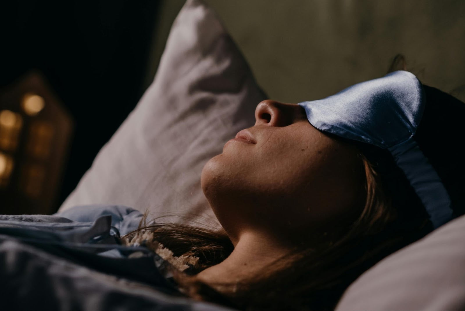 woman with sleep mask sleeping