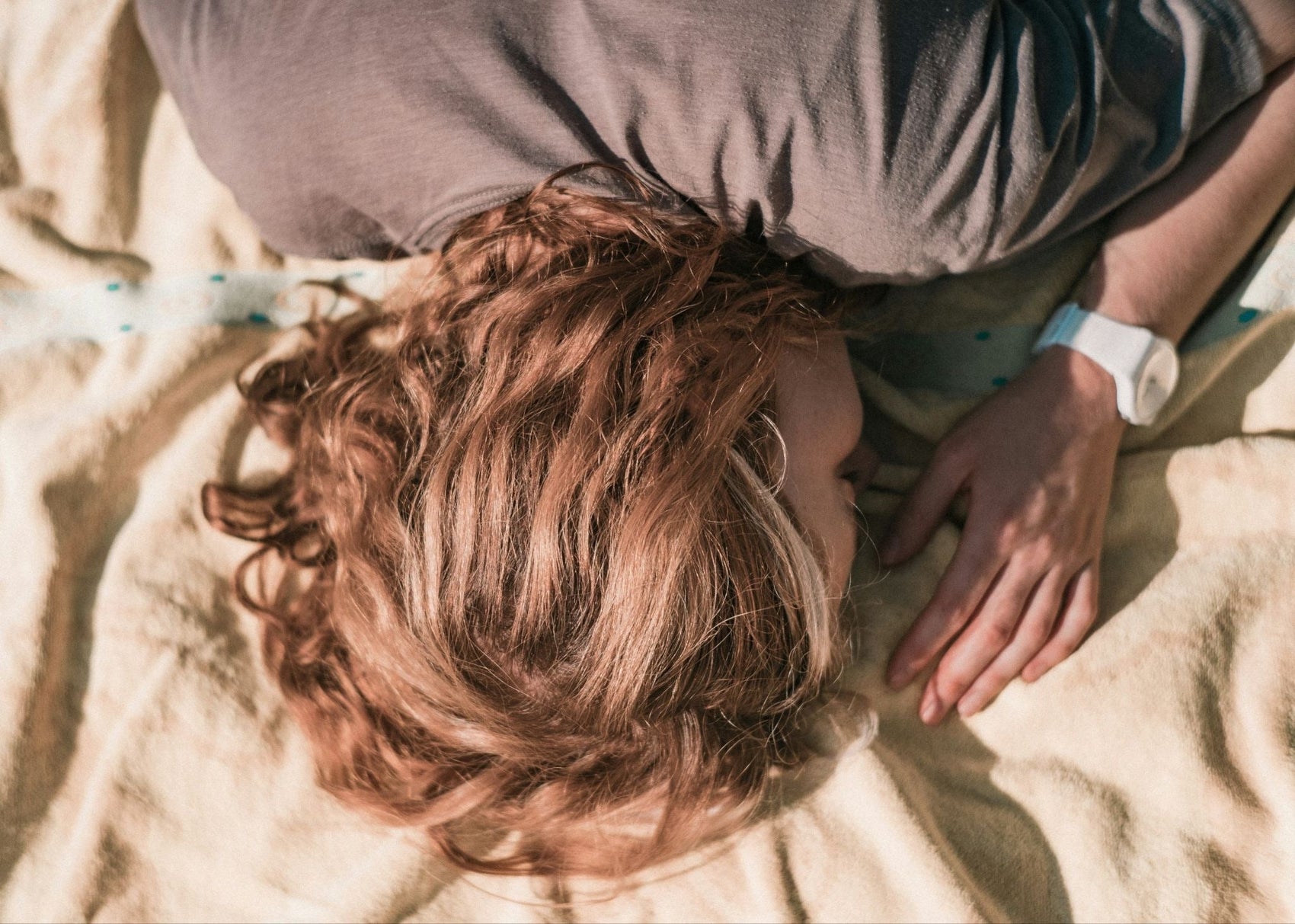 woman sleeping on a bed